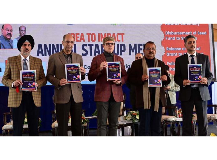 Chief Minister releasing a booklet at a function held at Jammu on Thursday.