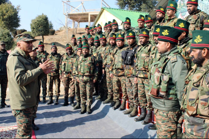 Northern Army Commander Lt Gen Pratik Sharma interacting with troops in North Kashmir on Saturday.