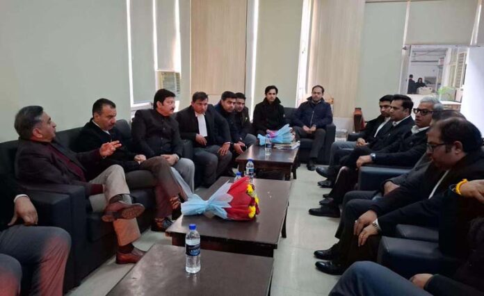 Justice Sanjeev Kumar and Justice Sanjay Parihar and J&K HC Bar Association Jammu office bearers during interaction on Thursday.