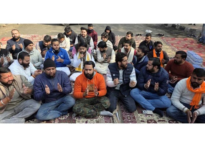 Sangharsh Samiti Youth Wing members protesting outside Civil Secretariat in Jammu on Tuesday. -Excelsior/Rakesh