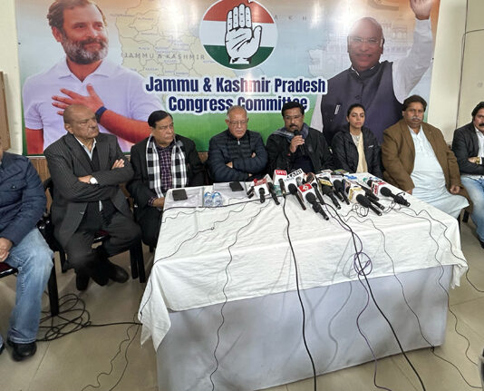 AICC gen secy Dr Naseer Hussain, flanked by others addressing press conference in Jammu. -Excelsior/Rakesh