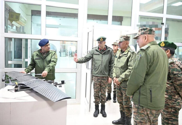 Northern Army Commander Lt Gen Pratik Sharma being briefed about a drone.