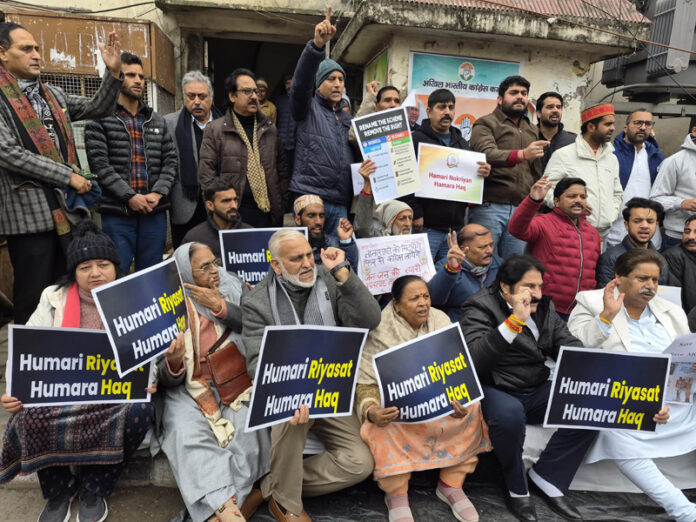 Cong leaders and workers staging protest against BJP Govt in Jammu on Monday. — Excelsior/Rakesh