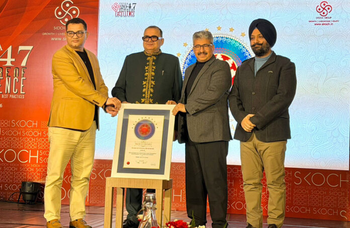 Director Industries and Commerce Jammu Dr Arun Manhas receiving award at New Delhi on Saturday.