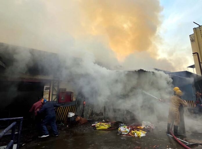 Flames emanate from the Pencil Factory at Talab Tillo as Fire & Emergency Department try to restrict the fire. -Excelsior/Rakesh Flames emanate from the Pencil Factory at Talab Tillo as Fire & Emergency Department try to restrict the fire. -Excelsior/Rakesh