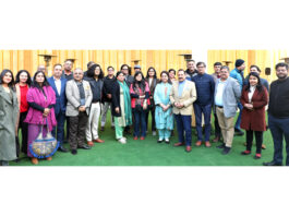 Union Minister Dr Jitendra Singh posing for a group photograph with a group of journalists and media persons after the lunch at his official residence, at New Delhi on Saturday.