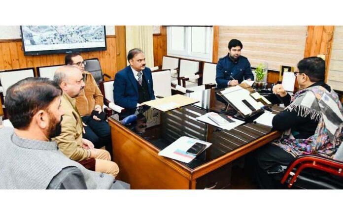 Minister Javed Rana chairing a meeting on Friday. Minister Javed Rana chairing a meeting on Friday.