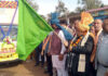 Senior NC leader Ajay Kumar Sadhotra flagging off Shobha Yatra of Guru Ravi Dass at Karwanda, Jammu.