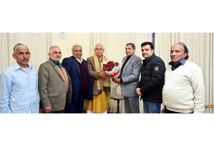 A delegation posing with LG Manoj Sinha at Raj Bhawan, Jammu.