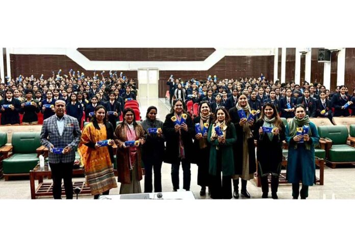 FICCI FLO JKL members and students as well as faculty members of APS Udhampur posing for a group photograph during an awareness programme on menstrual hygiene.