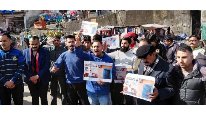 BJP activists led by senior leader, Radhish Sharma, staging protest at Abdullah Bridge in Rajouri on Friday. -Excelsior/Imran BJP activists led by senior leader, Radhish Sharma, staging protest at Abdullah Bridge in Rajouri on Friday. -Excelsior/Imran