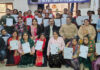 Passed out women trainees of mushroom cultivation training program posing with their certificates.