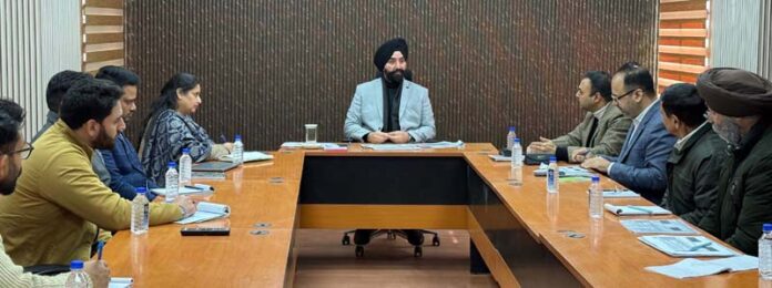 Labour Commissioner, J&K, Charandeep Singh chairing a meeting of officers in Jammu on Wednesday.