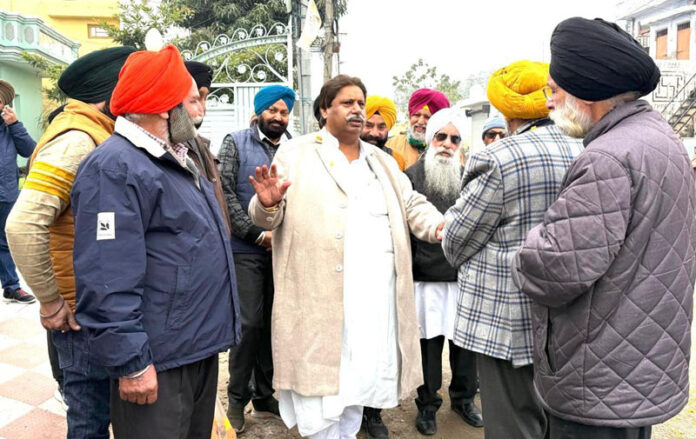 JKPCC working president Raman Bhalla interacting with people in Jammu South on Wednesday.