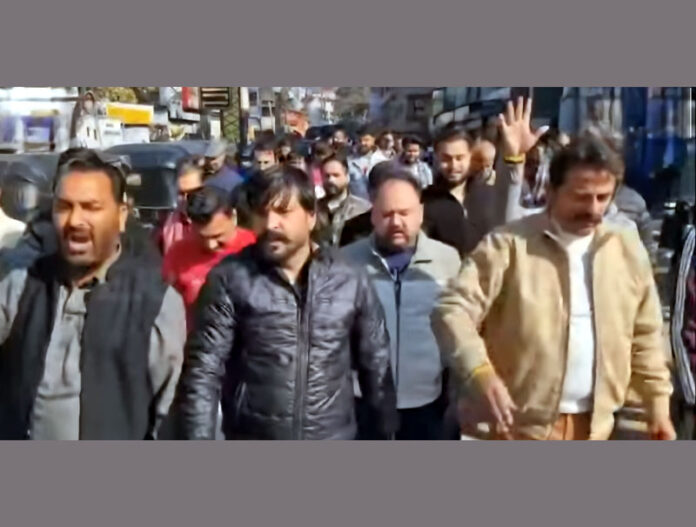 Members of Sangarsh Samiti taking out protest march in Katra on Wednesday.
