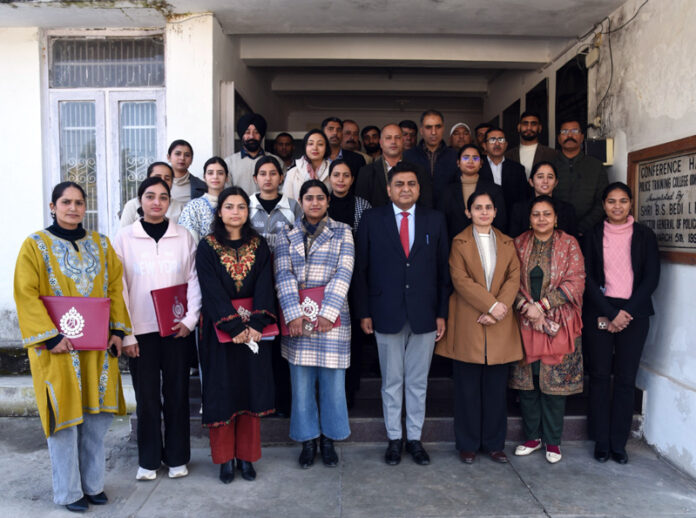 SSP Rajinder Kumar Gupta posing for a group photograph with the trainee officers at SKPA Udhampur on Saturday.