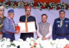 Governor of Chhattisgarh, Ramen Deka presenting Silver Star Award to Wg Cdr MM Joshi during a function at Dudhali, Balod, Chhattisgarh.