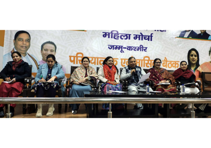 Sat Sharma, president JK BJP and MP (RS) along with leaders of BJP Mahila Morcha at a meeting at Jammu on Friday.