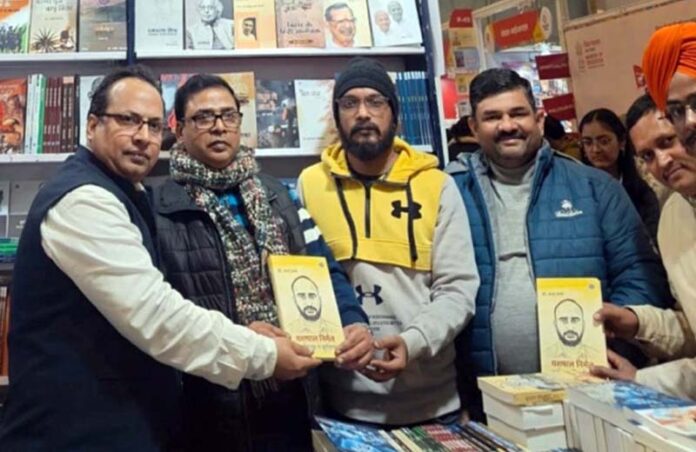 Dignitaries releasing a book based on the life and works of Dogri writer, Yashpaul Nirmal at New Delhi.