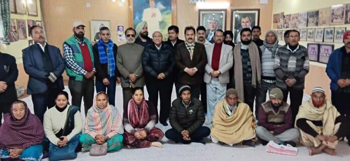 Senior NC leaders during interaction with party functionaries from Udhampur at party office in Jammu.