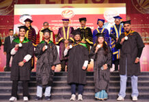 Students posing with their medals during a function at LPU on Monday.