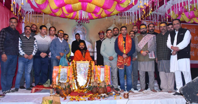 Narendra Singh Bhau posing along with the Suraj Shastri Ji Maharaj in Akhnoor.