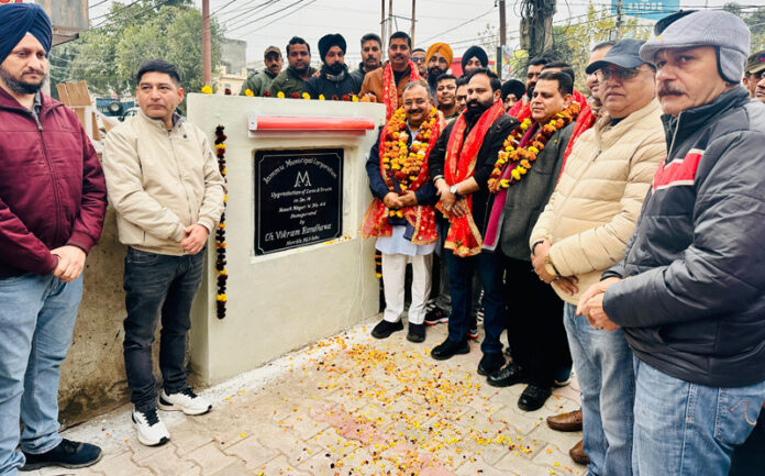 MLA Bahu, Ch Vikram Randhawa inaugurating lane and drain work in Nanak Nagar on Monday. MLA Bahu, Ch Vikram Randhawa inaugurating lane and drain work in Nanak Nagar on Monday.