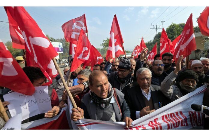 CPI(M) activists staging protest in Jammu. -Excelsior/Rakesh CPI(M) activists staging protest in Jammu. -Excelsior/Rakesh