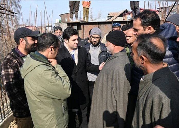 DC Kulgam reviewing developmental work in Qaimoh area on Tuesday.