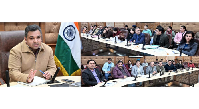 Dr Piyush Singla chairing a meeting at Jammu on Friday.
