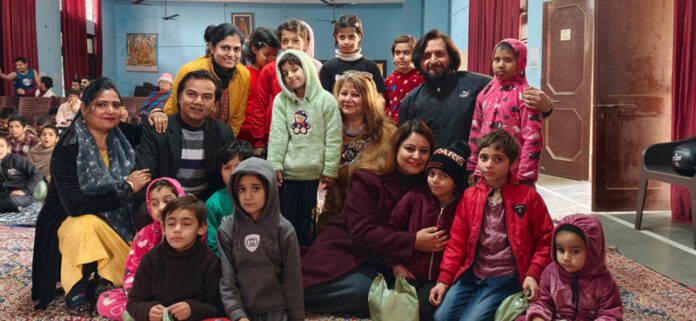 Artists of AKSV along with children of Bal Niketan, Amphalla posing for a photograph after a cultural programme in Jammu on Sunday. Artists of AKSV along with children of Bal Niketan, Amphalla posing for a photograph after a cultural programme in Jammu on Sunday.