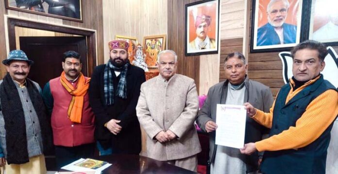 National general secretary, BRHF handing over a letter addressed to PM to BJP president and MP (RS), Sat Sharma at Jammu on Wednesday in presence of party general secretary (org), Ashok Koul and other leaders on Wednesday.