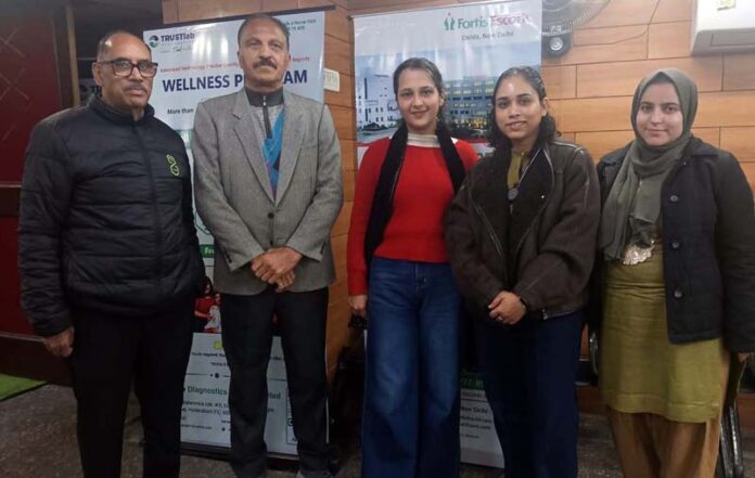 Dr Swati Mahajan posing with her team after a heart check-up camp at Jammu.