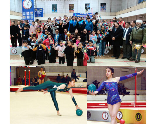 Dignitaries posing along with Gymnasts during prize distribution ceremony and Gymnasts performing during UT Championship at MA Stadium, Jammu on Sunday. -Excelsior/Rakesh