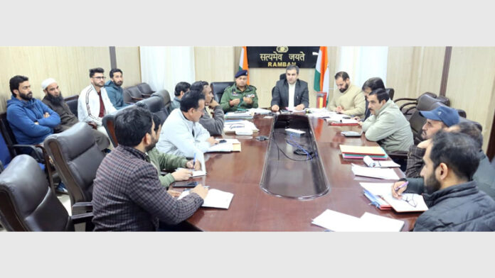 DC Mohammad Alyas Khan chairing a meeting of the District Road Safety Committee (DRSC) and District Level Monitoring Committee (DLMC), in Ramban.