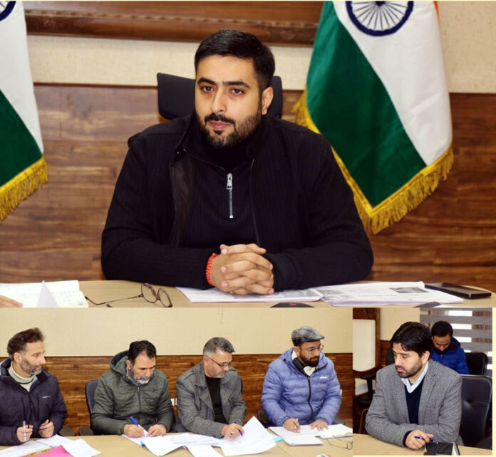 DC Akshay Labroo reviewing the progress on the saturation of various Government flagship schemes in the Rural Blocks of Srinagar district .