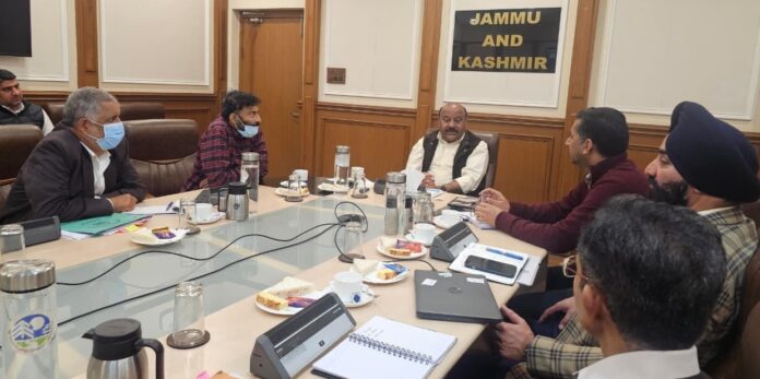 Deputy Chief Minister chairing a meeting in Jammu on Tuesday.