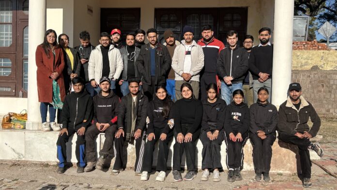 Organizers of free medical camp posing for a group photograph in Udhampur.