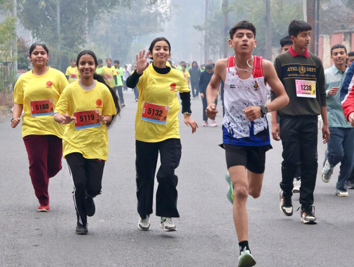 Young runners during the ‘Mini Marathon 1.0 – Run with the Rising Sun organised by the Department of Youth Services & Sports, Jammu on Sunday. Young runners during the ‘Mini Marathon 1.0 – Run with the Rising Sun organised by the Department of Youth Services & Sports, Jammu on Sunday.