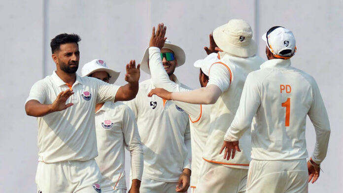 Aqib Nabi celebrating with teammates after taking a wicket on 3rd day of the Ranji Trophy final. Aqib Nabi celebrating with teammates after taking a wicket on 3rd day of the Ranji Trophy final.