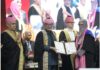 Vice President CP Radhakrishnan gives degree to a student during KU convocation in Srinagar on Thursday.