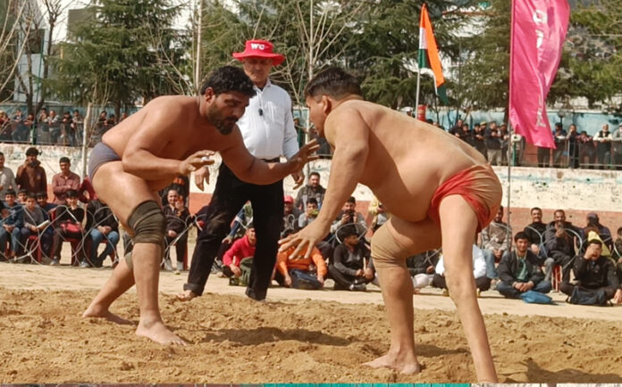 Wrestlers in action during a thrilling bout at Dangal in Doda.