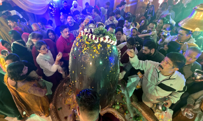 Devotees offer prayers at Ranbireshwar Temple in Jammu on Mahashivratri occasion. -Excelsior/Rakesh