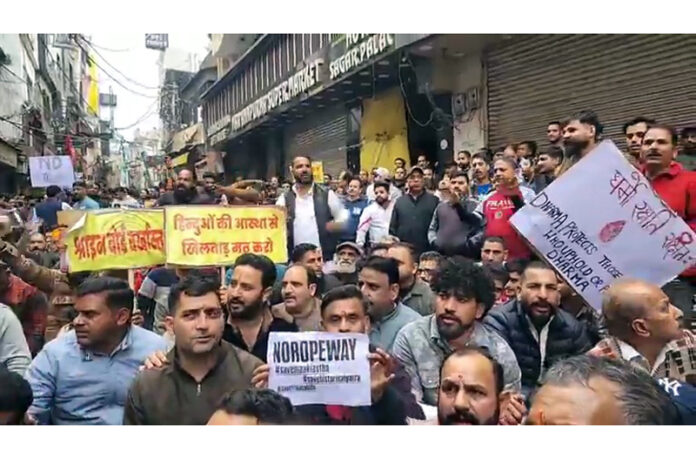 Locals taking out protest march at Katra on Wednesday. -Excelsior/Romesh Mengi