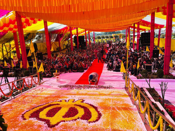 Devotees participating in a function held at Gurudwara Sri Guru Arjun Dev Ji at Nanak Nagar in Jammu on Sunday.