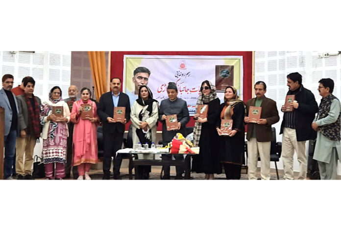 Speaker LA and others releasing a book at Jammu on Monday.