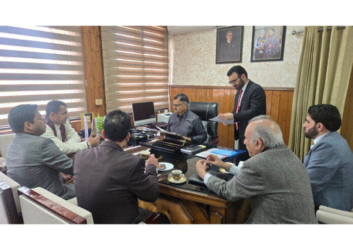 Legislators meeting Minister Javed Rana at Jammu on Monday.
