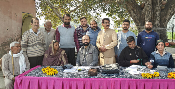 HoD Cardiology GMC & SSH Jammu Dr Sushil Sharma examining patients at Bishnah on Sunday. HoD Cardiology GMC & SSH Jammu Dr Sushil Sharma examining patients at Bishnah on Sunday.