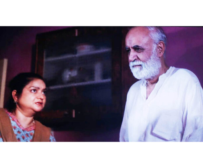 Veteran actor M.K.Raina and Kusum Tickoo in a scene from the film ‘Batt Koch’ which premiered in Jammu on Wednesday. Veteran actor M.K.Raina and Kusum Tickoo in a scene from the film ‘Batt Koch’ which premiered in Jammu on Wednesday.
