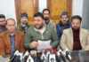 EJAC leader addressing press conference in Srinagar on Wednesday.